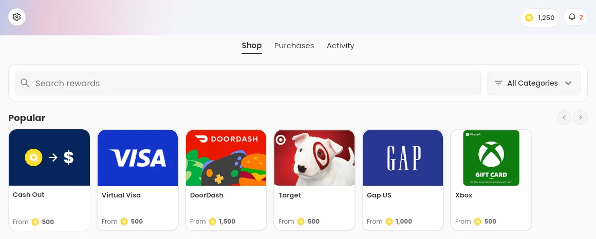The Rewards Shop tab, with the token balance at the top, the search field, the All Categories filter, and the Popular row, which starts with the Cash Out card and shows the starting price in tokens of each reward.
